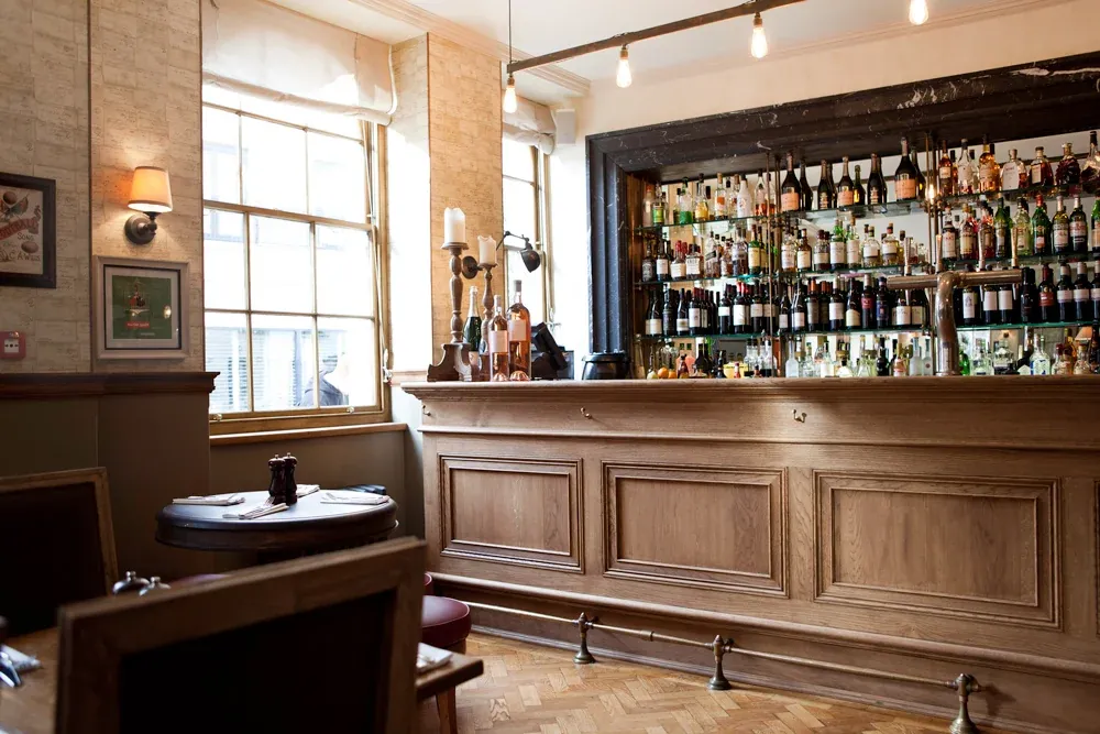 Commercial interior design project by Studio Bernardi, refined hospitality space with bespoke detailing