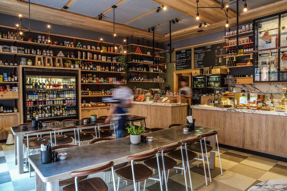Bar and hospitality interior design by Studio Bernardi, layered lighting and tailored joinery